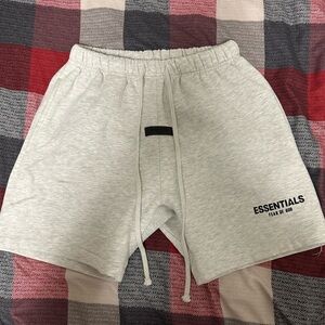 Fear of God Essentials light oatmeal shorts